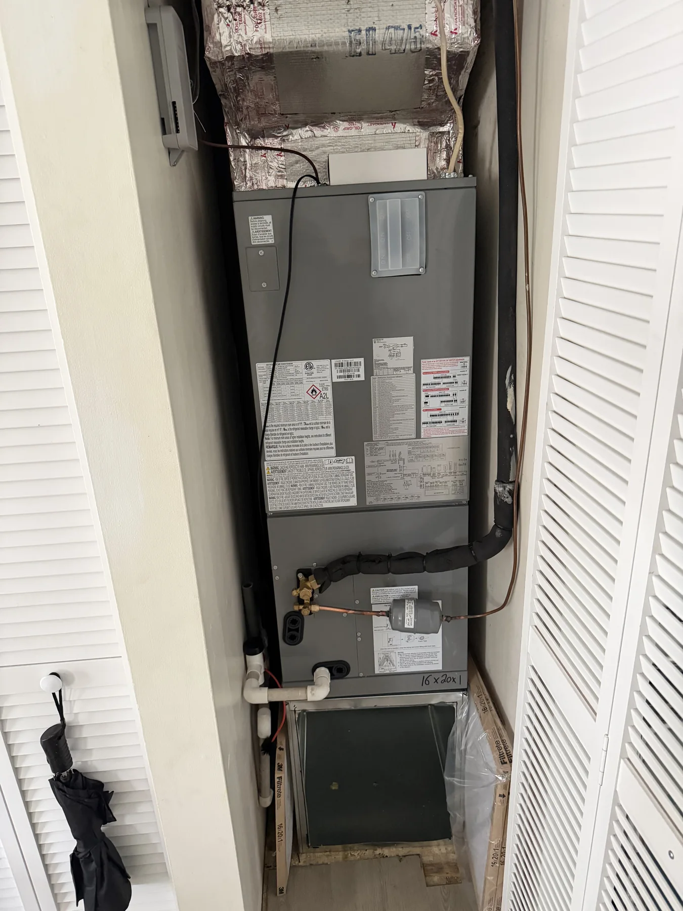 Commercial air handling equipment installed above a finished ceiling