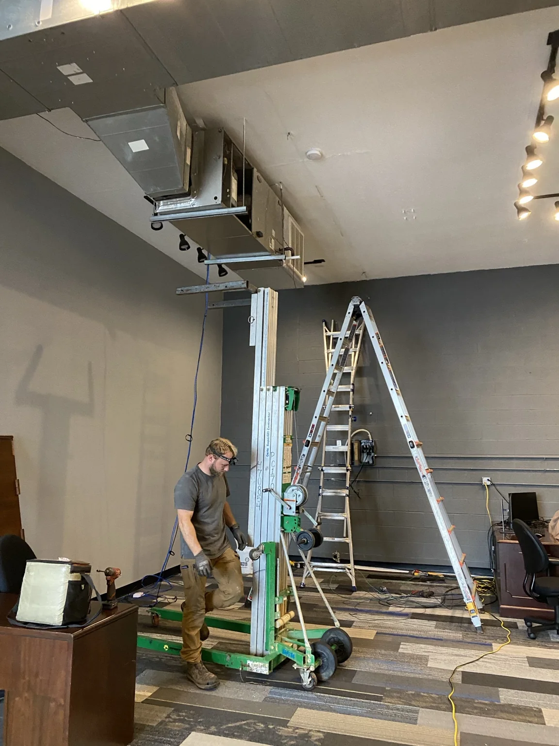 MDS Mechanical technician working on a commercial HVAC installation