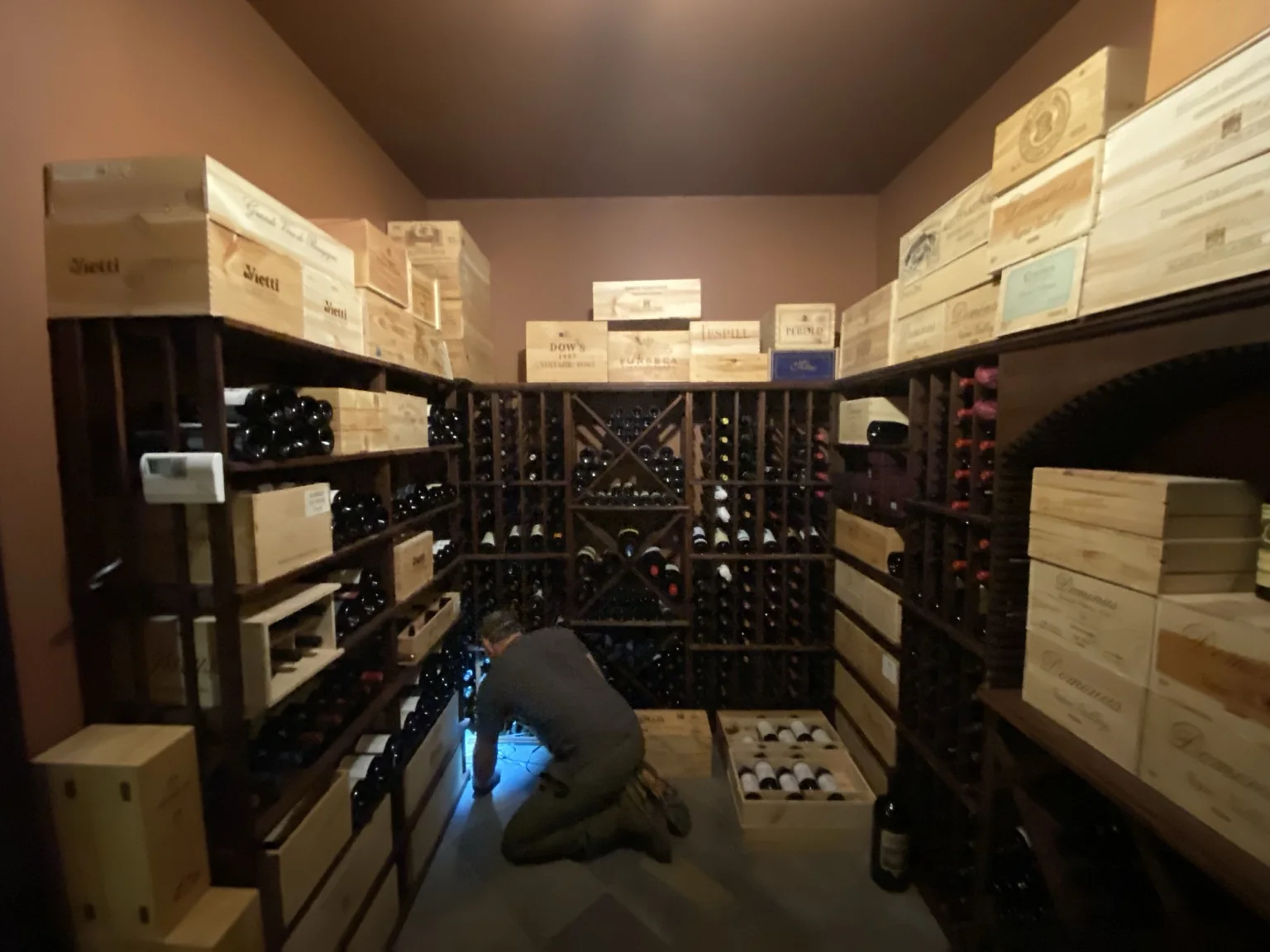 MDS Mechanical technician working inside a climate-controlled wine cellar in McLean, Virginia
